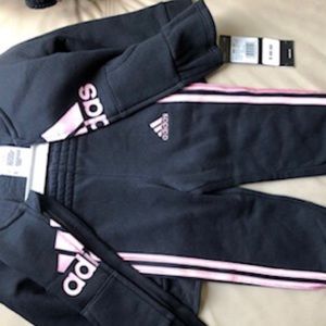 Two Adidas infant outfits in two sizes.